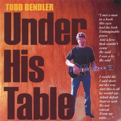 UNDER HIS TABLE